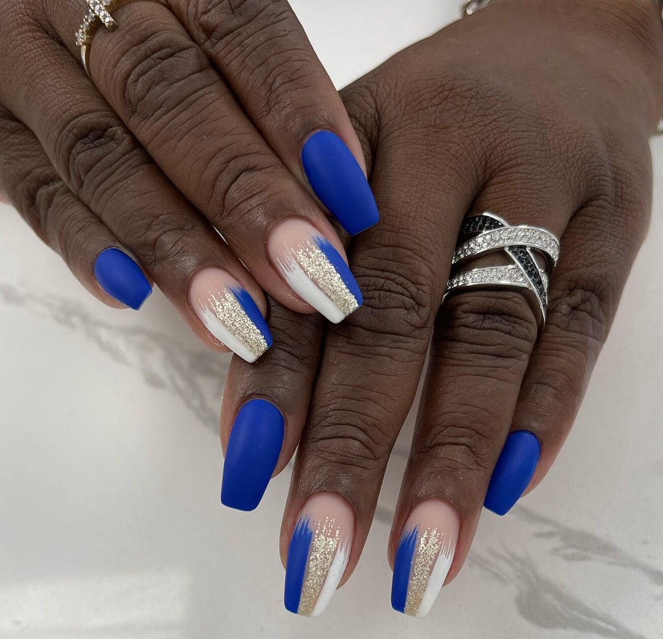 Royal blue nail polish in matte finish plus stylish nail art on long coffin nails