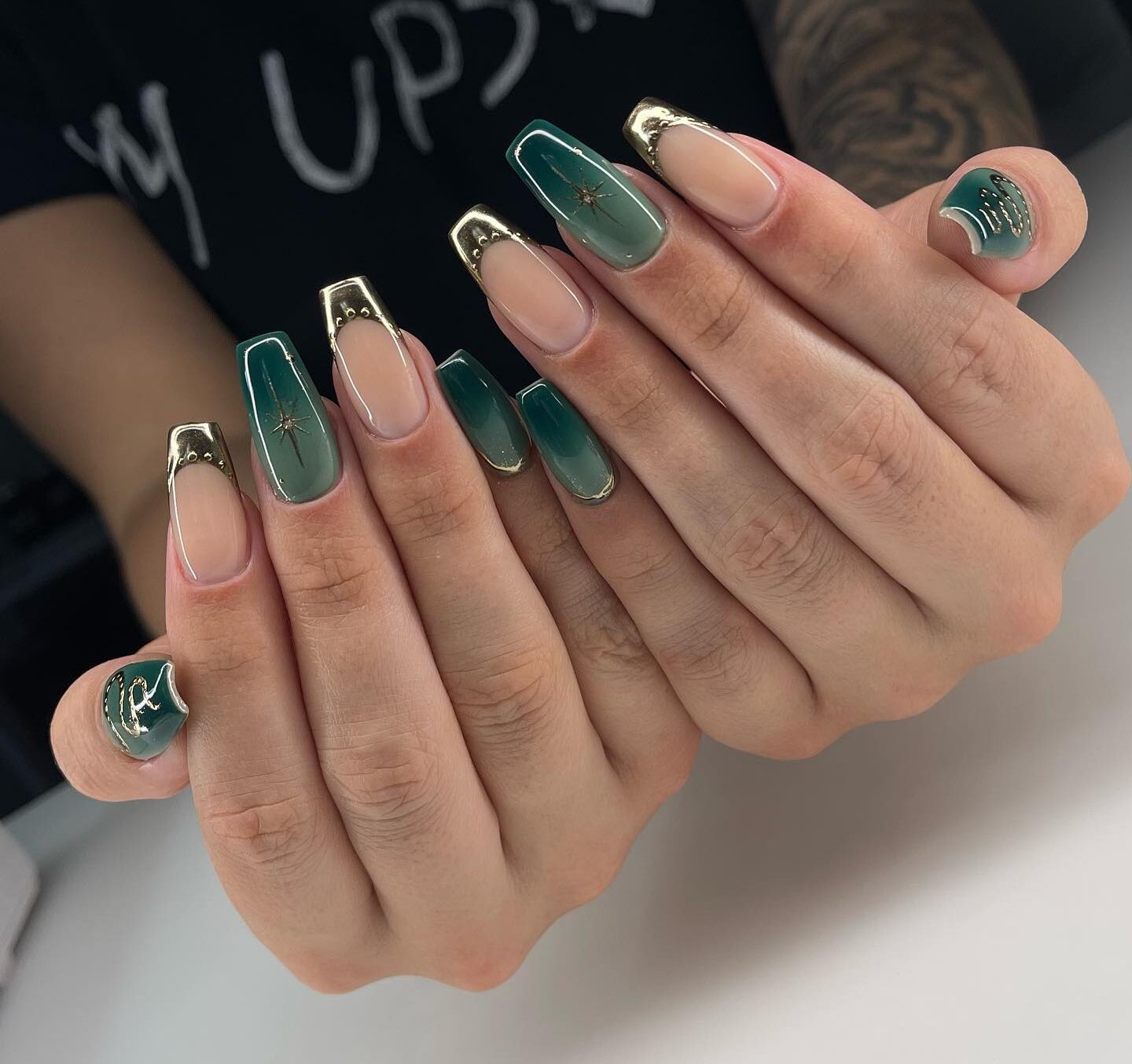 Green ombre effect and gold French tips on long tapered square nails