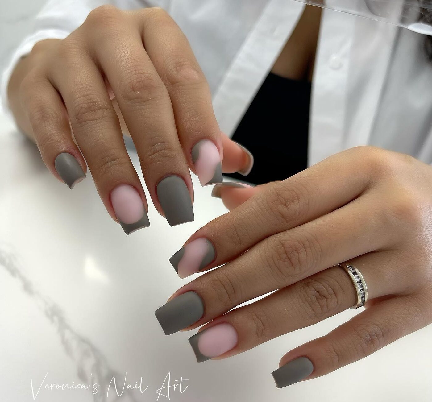 Matte finish grey nail polish and grey French tips on medium square nails