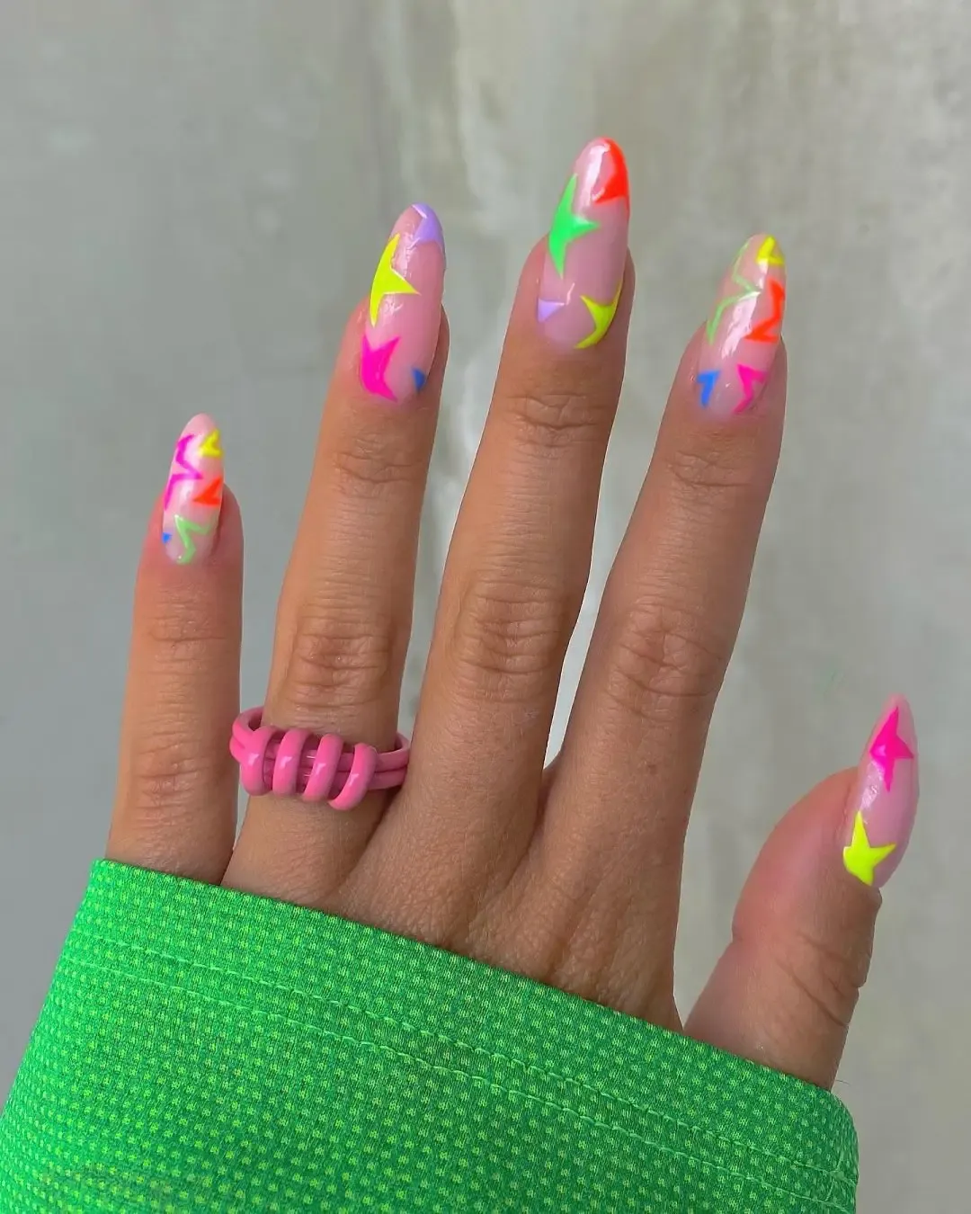 Neon star nails.