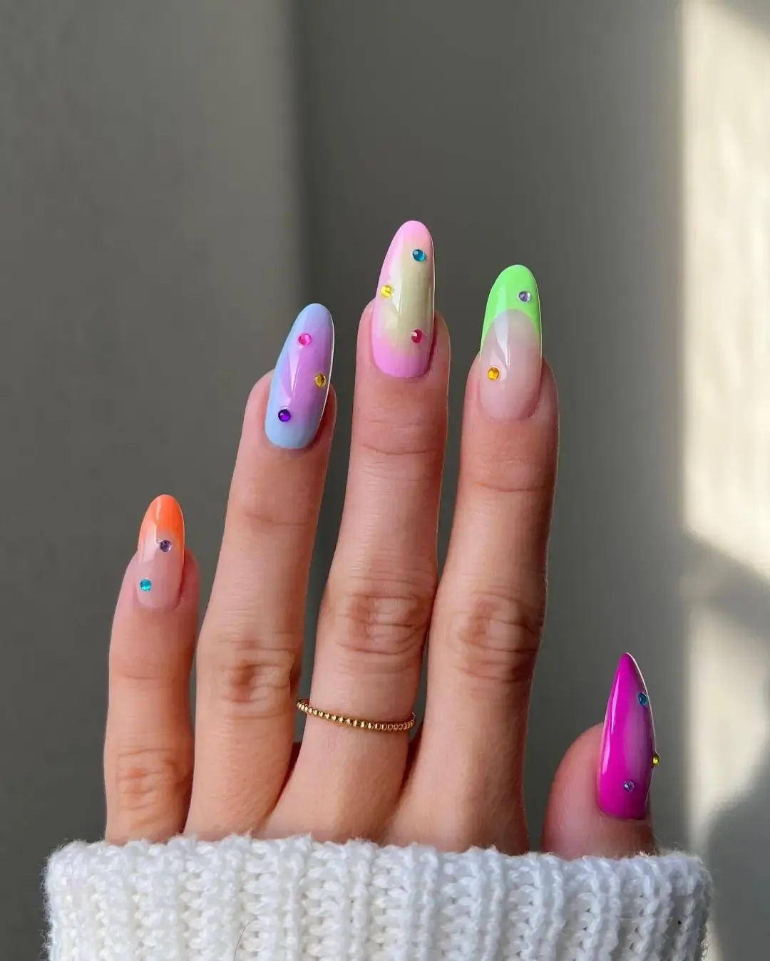 Neon marble nails with crystals.