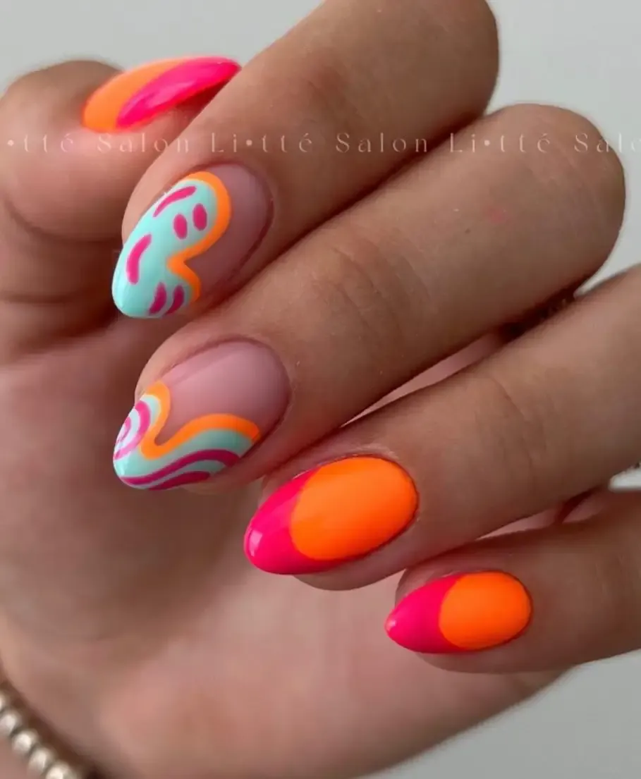 Neon orange and pink summer nails.