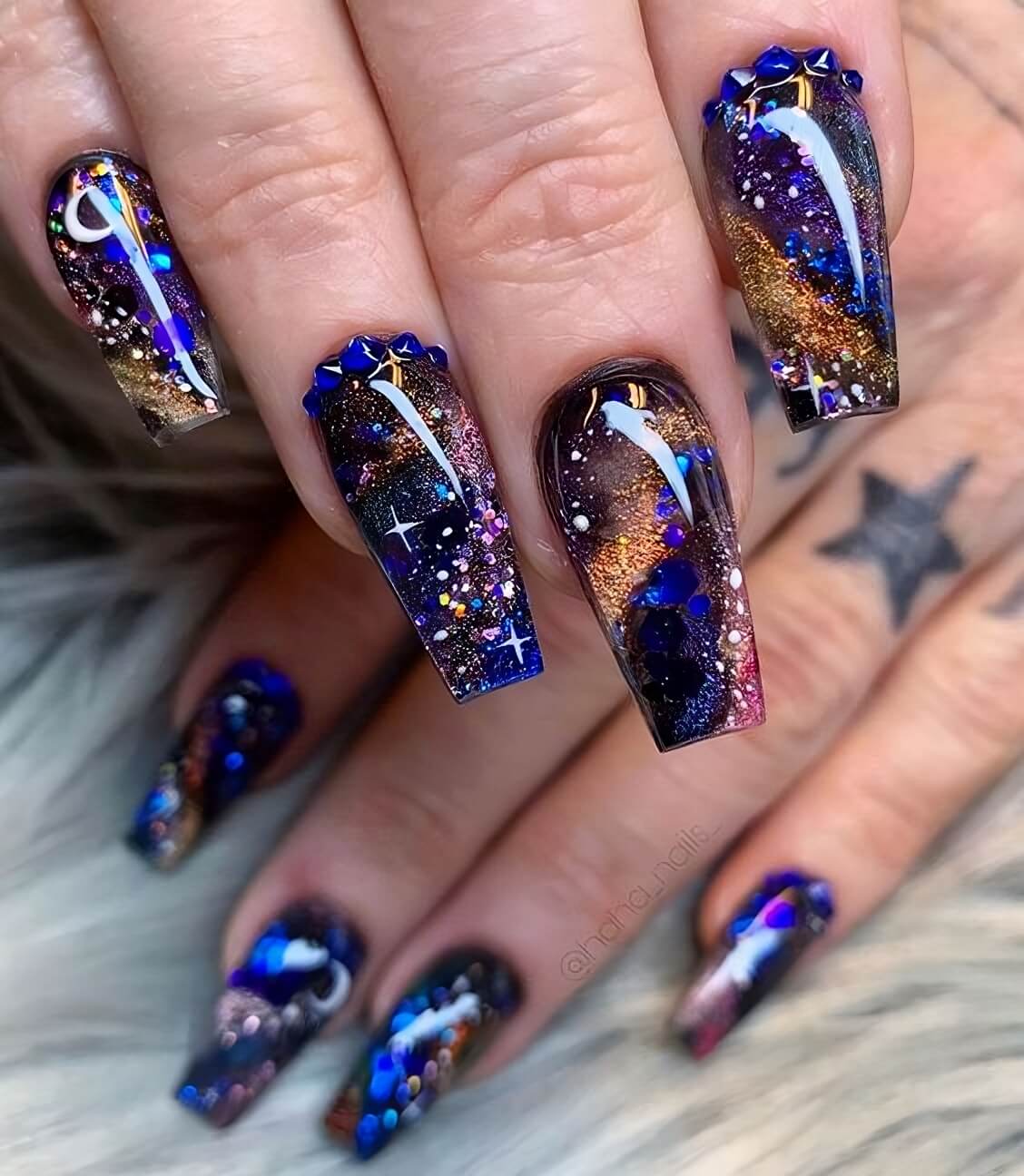 Up your manicure game with these 30 stunning galactic nail art ideas – The Daily Worlds