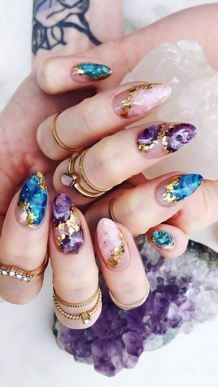 Up your manicure game with these 30 stunning galactic nail art ideas – The Daily Worlds